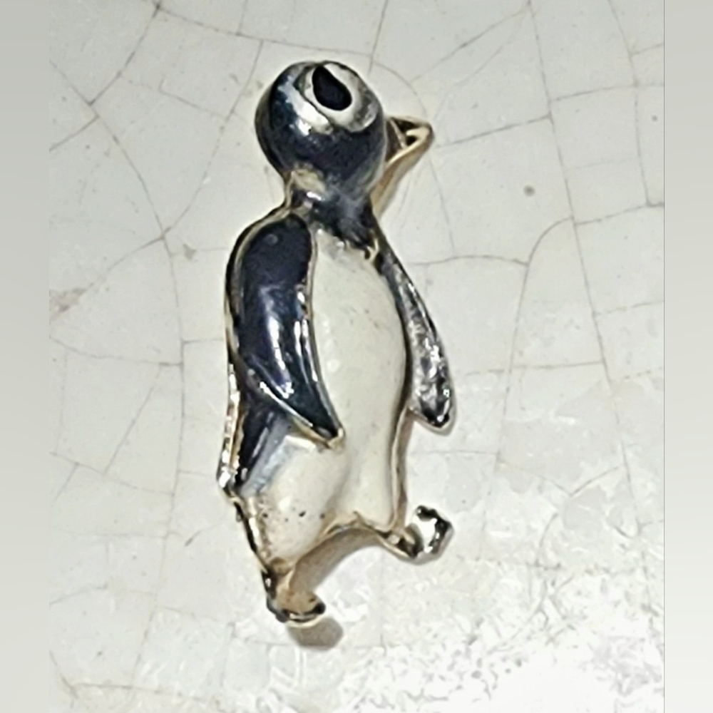 Small collector's item black white penguin scatter pin, tie tack, lapel brooch